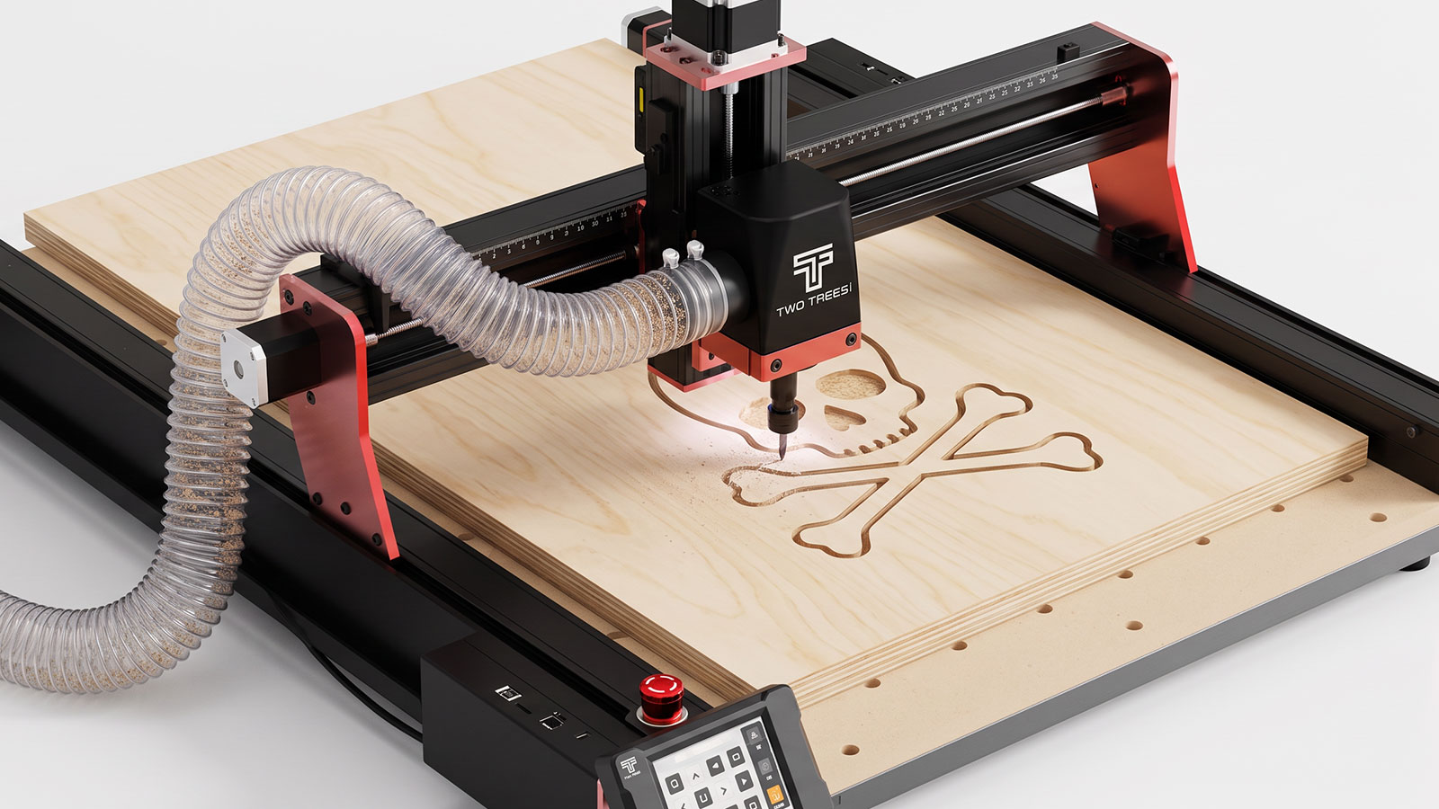 A CNC router mid-cut through a sheet of plywood, with dust extraction hose attached