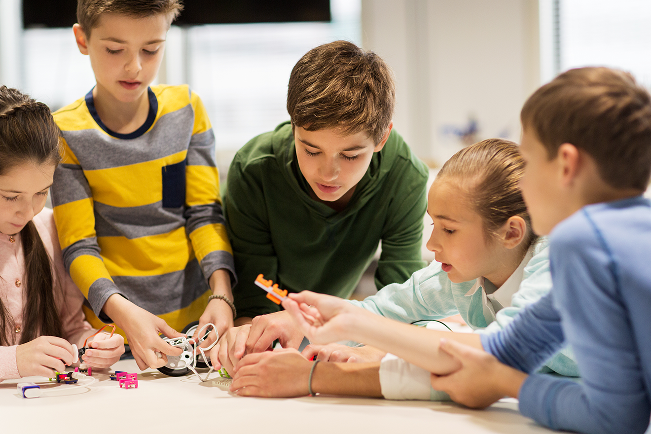 Students using 3D printing in a STEM classroom