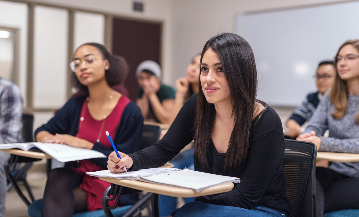 A group of students attending a language class with Berlitz