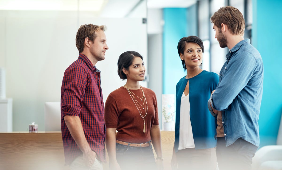 Group of students chatting before attending their in-person Japanese course