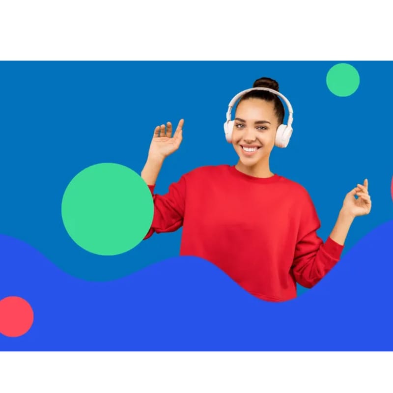 A cheerful woman in a red sweatshirt wears headphones and dances happily against a vibrant blue background with playful, colorful graphic shapes.