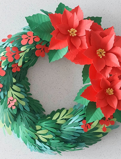 Christmas Paper Poinsettia Wreath - This is a poinsetta wreath paper craft.