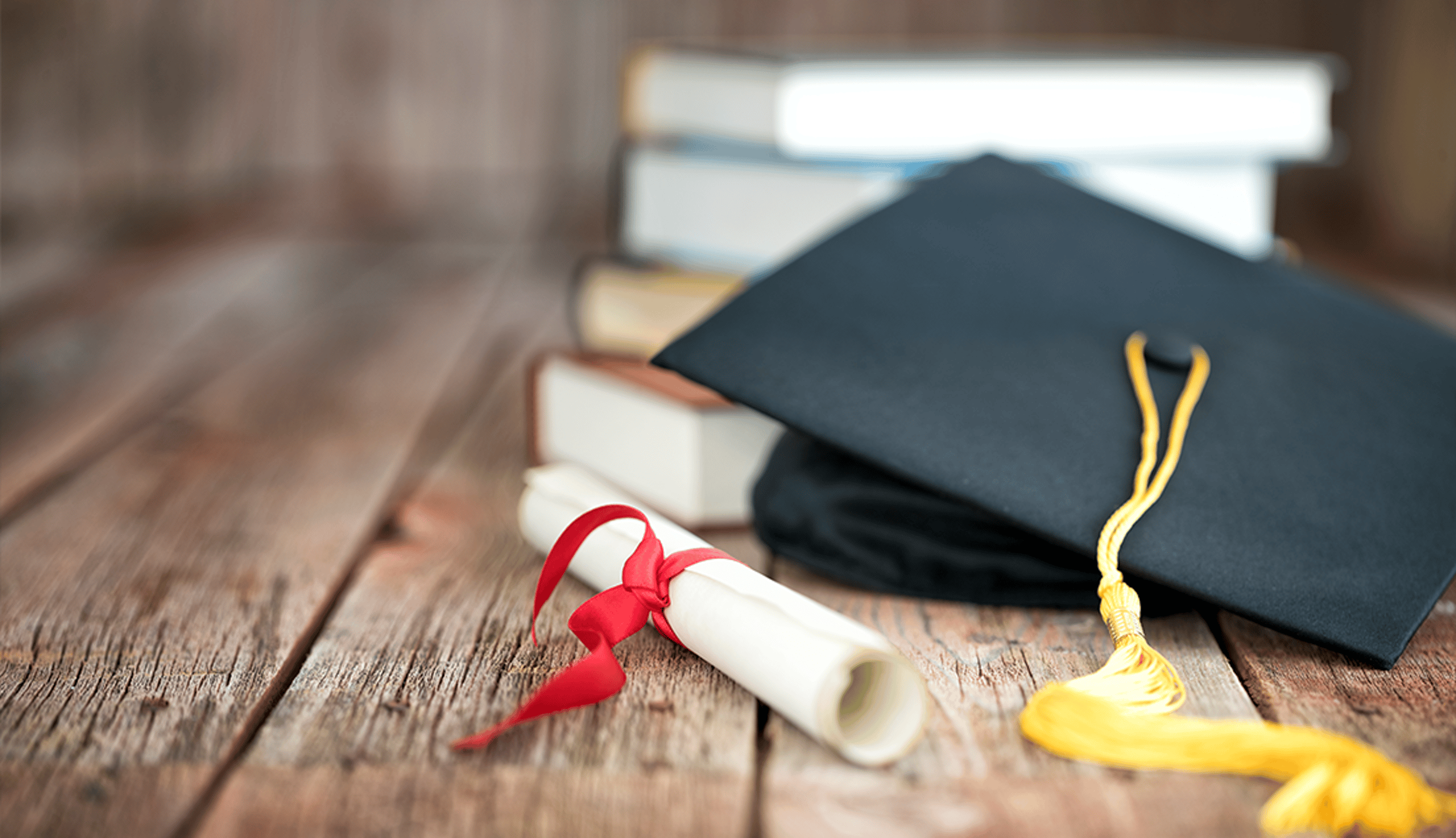 Graduation cap and scroll