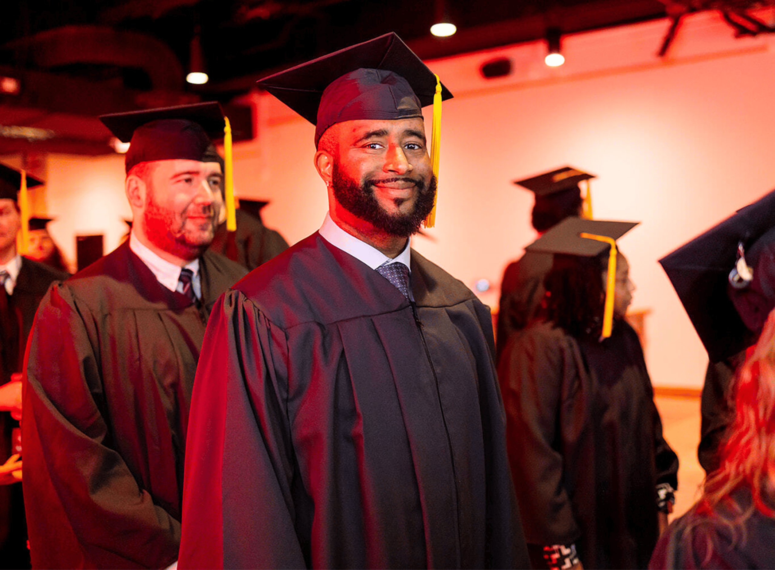  Graduates Smiling at Graduation