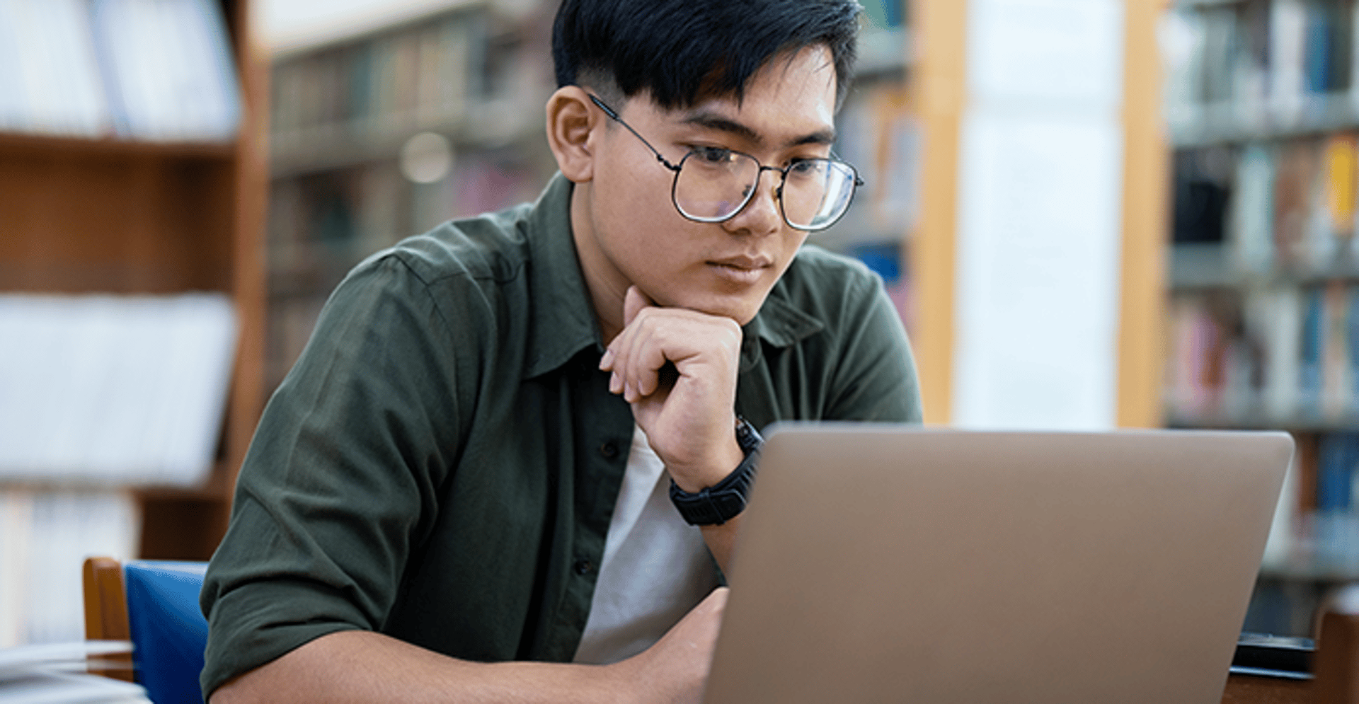 Man studying on a laptop