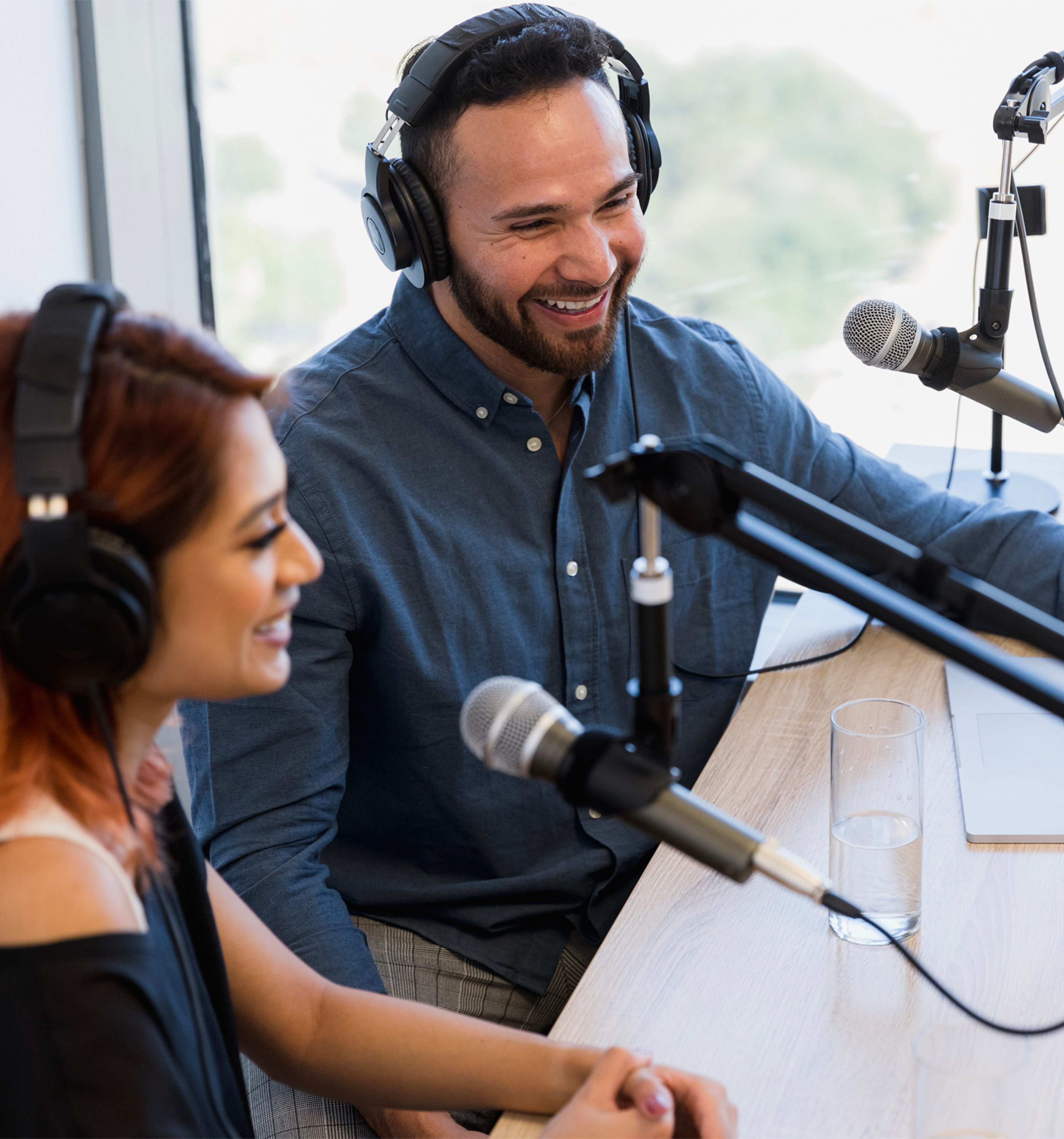Two people taking on a Webcast