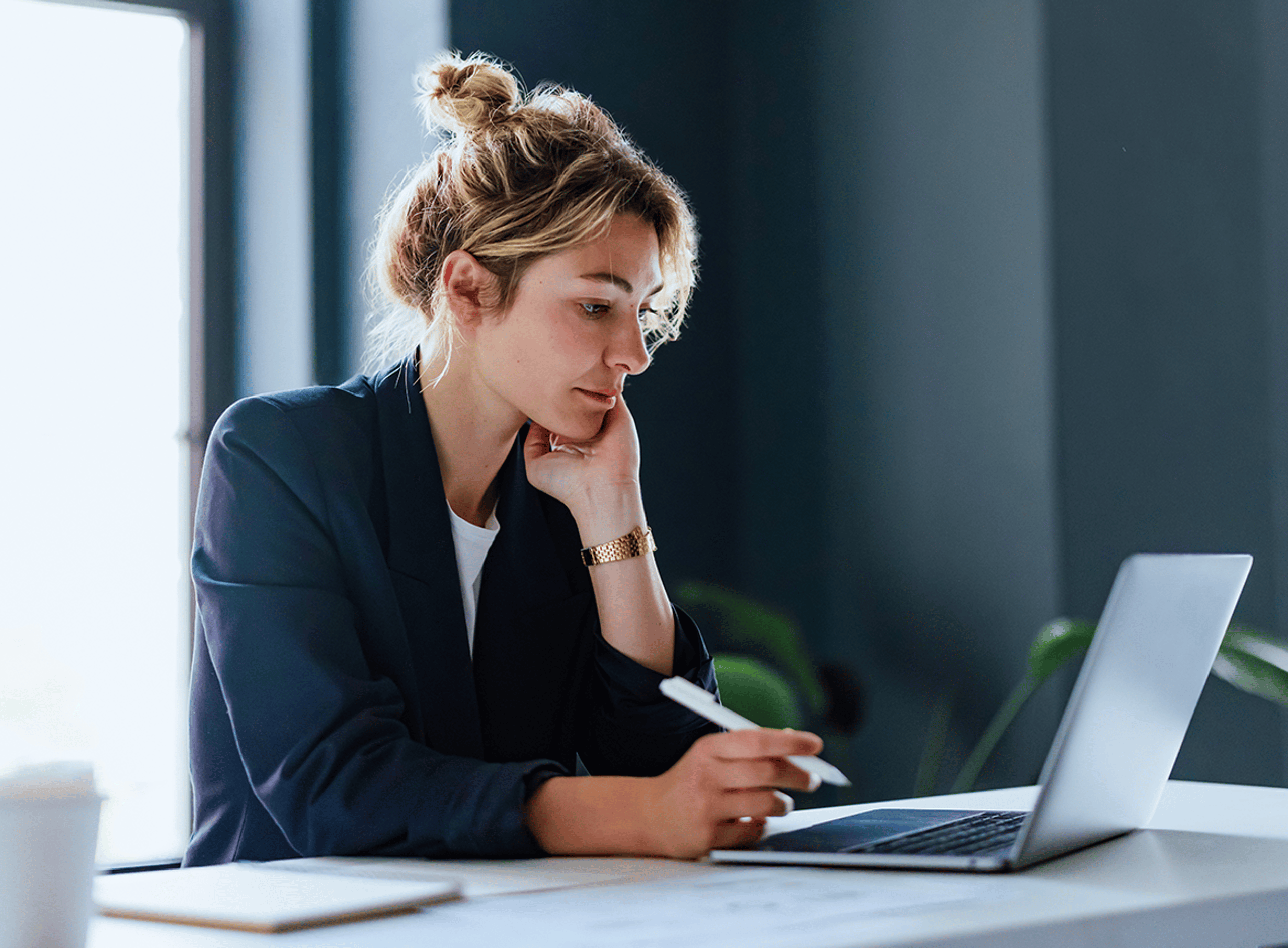 Woman studying at laptop
