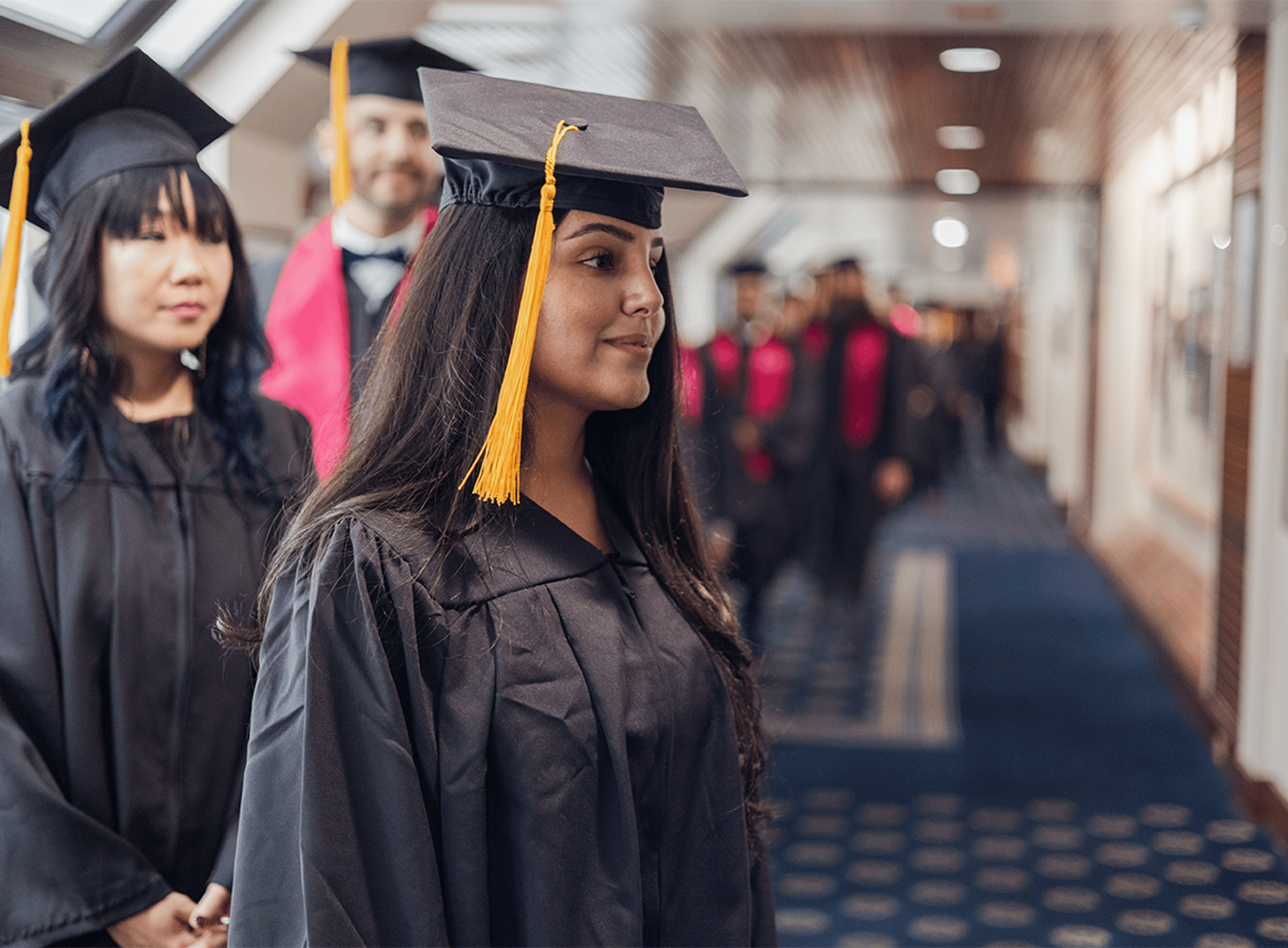 Graduate walking into ceremony