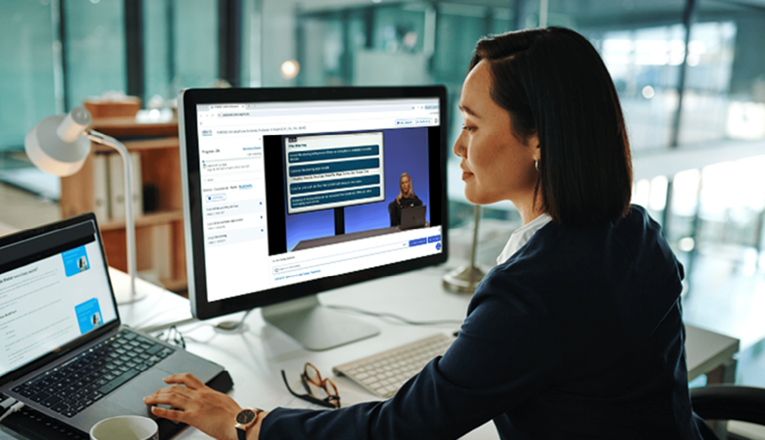 Woman Participating in Ondemand Training with Monitor Showing Training
