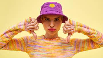 women in purple hat