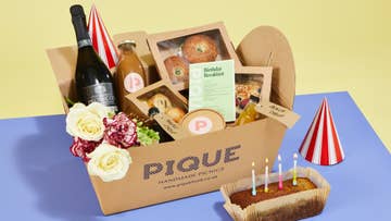 birthday hamper with bagels, pastries and banana loaf