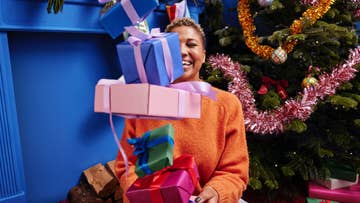 women holding wrapped boxes