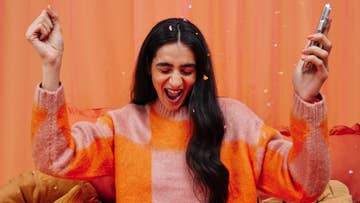 women wearing a orange jumper