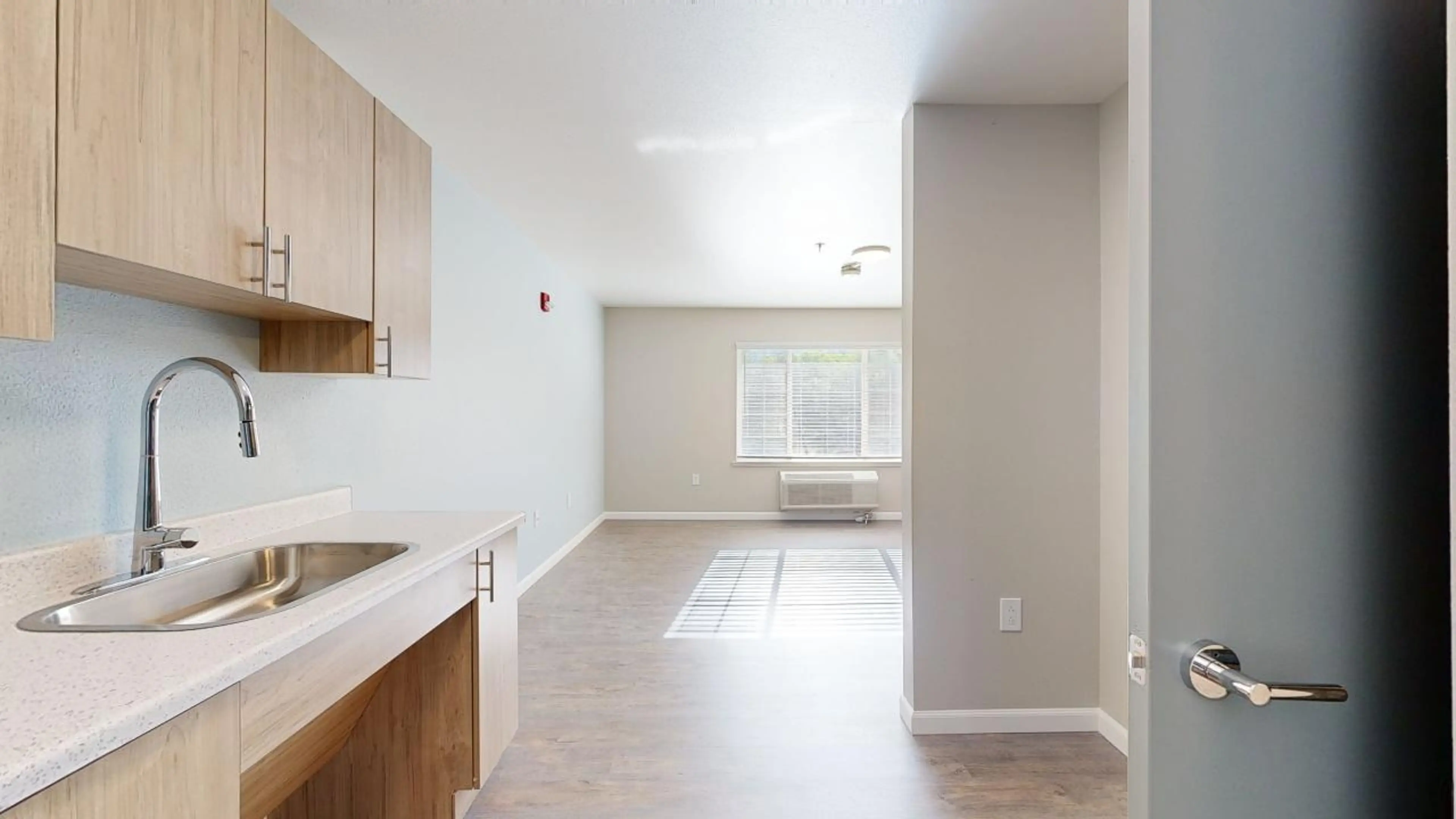 The Auberge at North Ogden Assisted Living Studio Alcove Living Room Side View