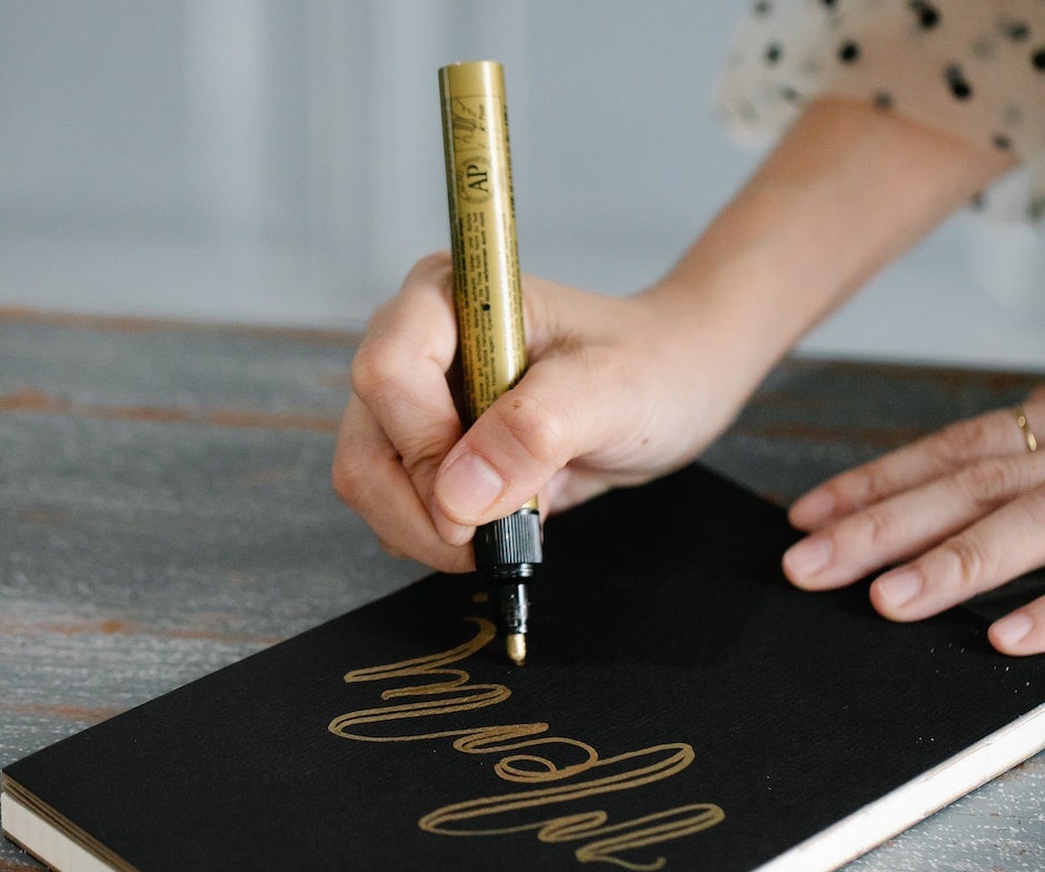 Women writing with a marker