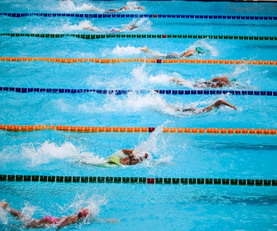 people in swimming heat