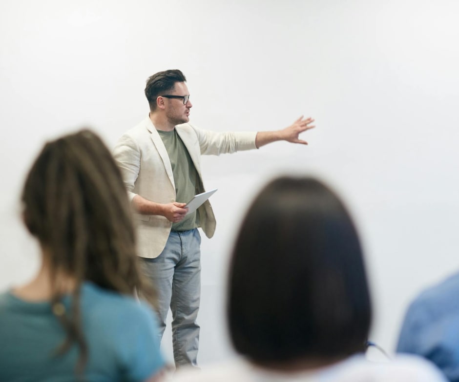 Man Presenting infront of an audience
