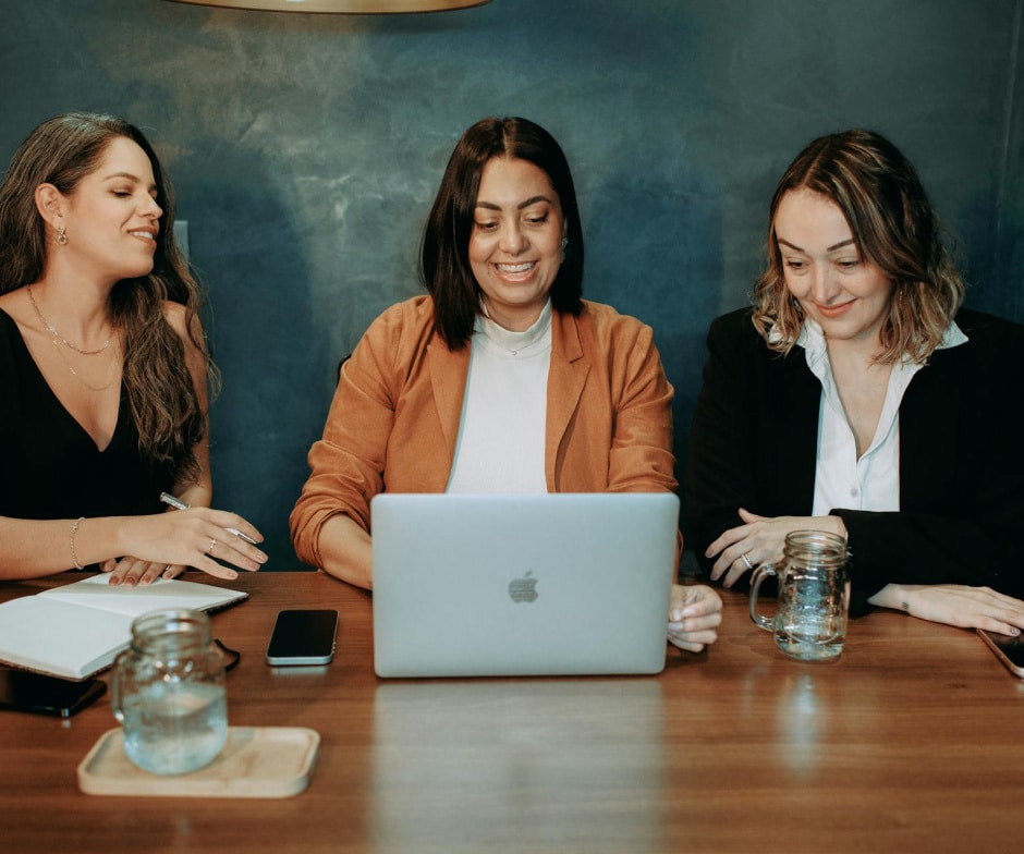 women working on laptop