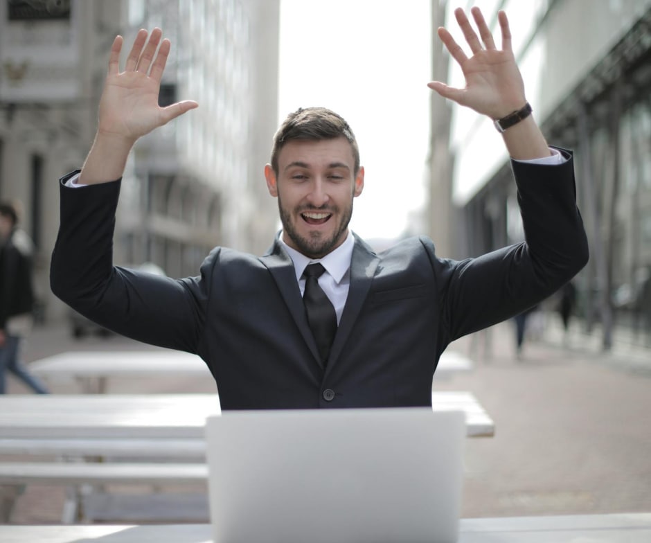person with arms up