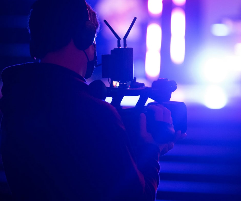 person working on camera
