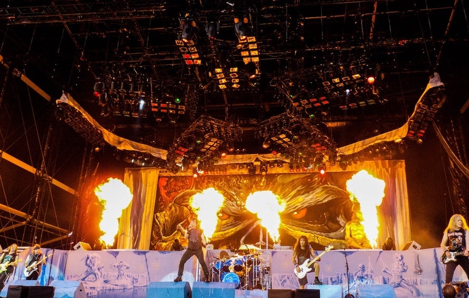 Iron Maiden performing on stage