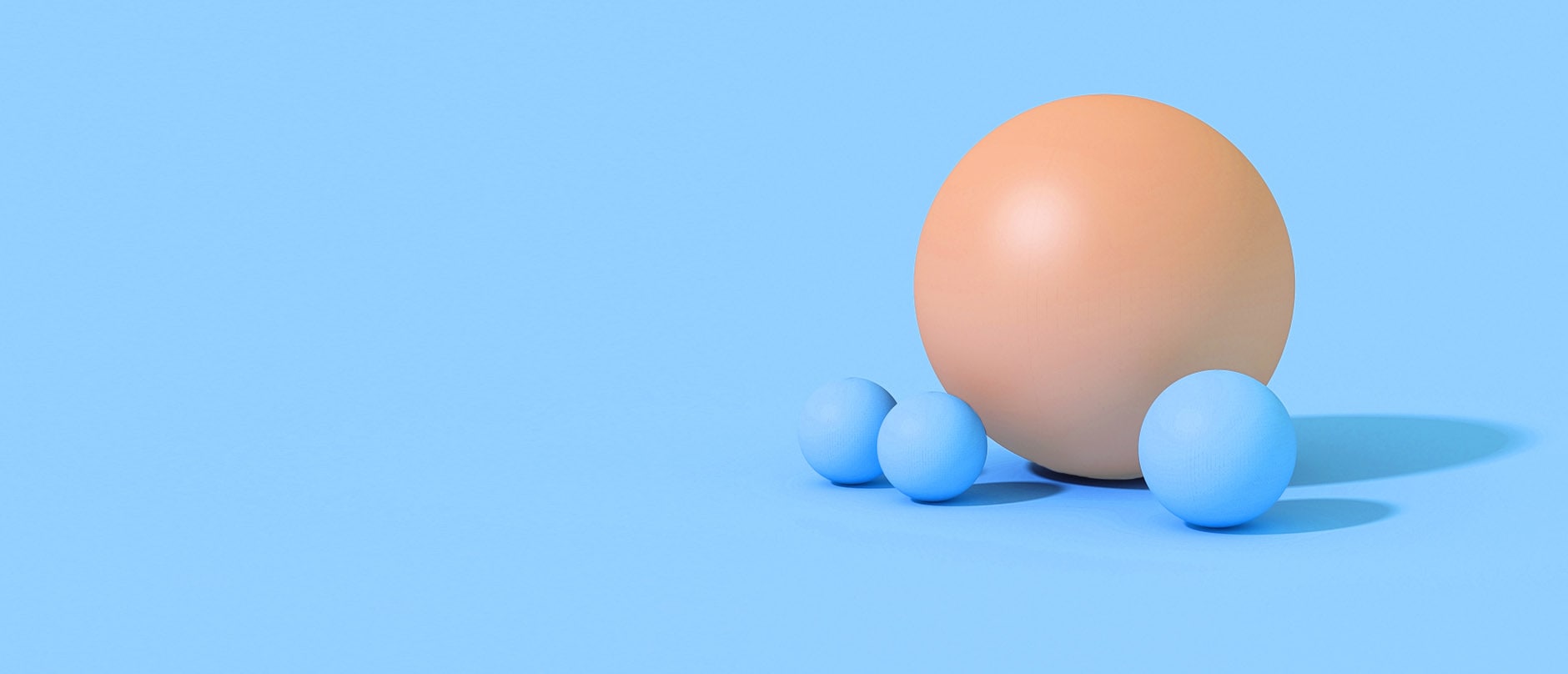 large orange ball with tiny blue balls
