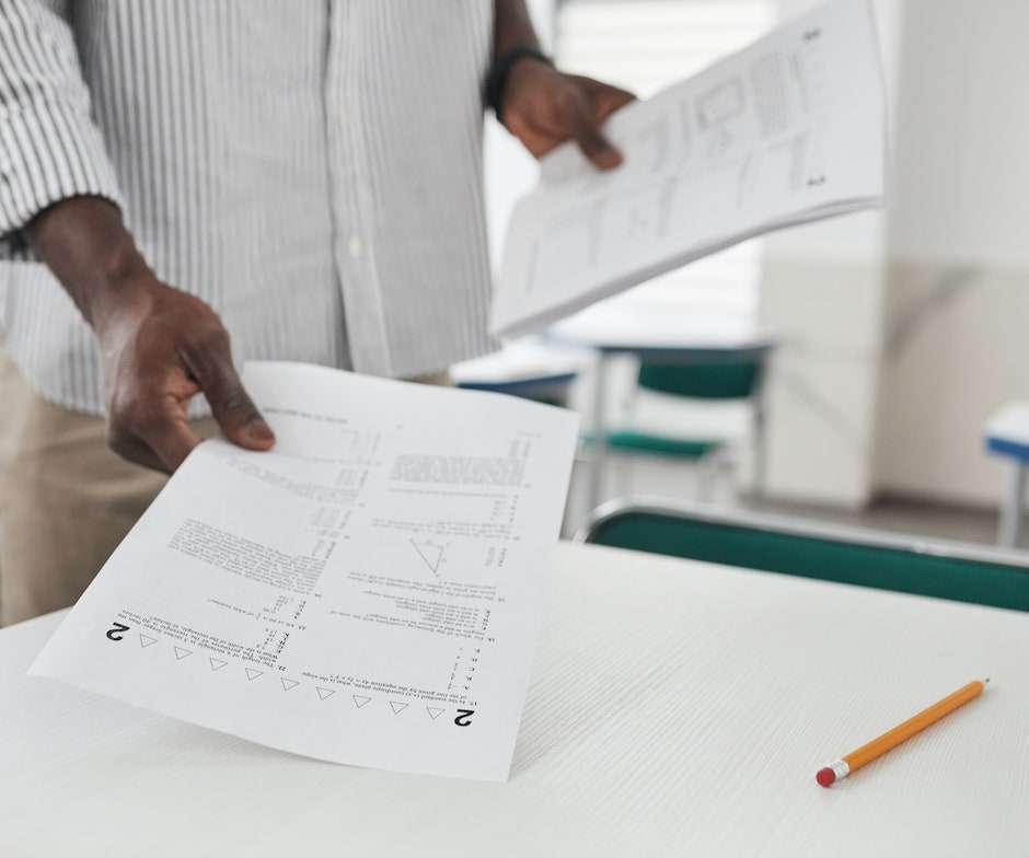 man holding papers