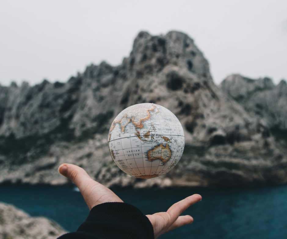 globe ball in someone's hand