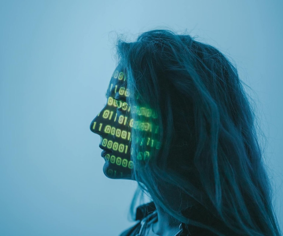 binnary numbers projected on persons face