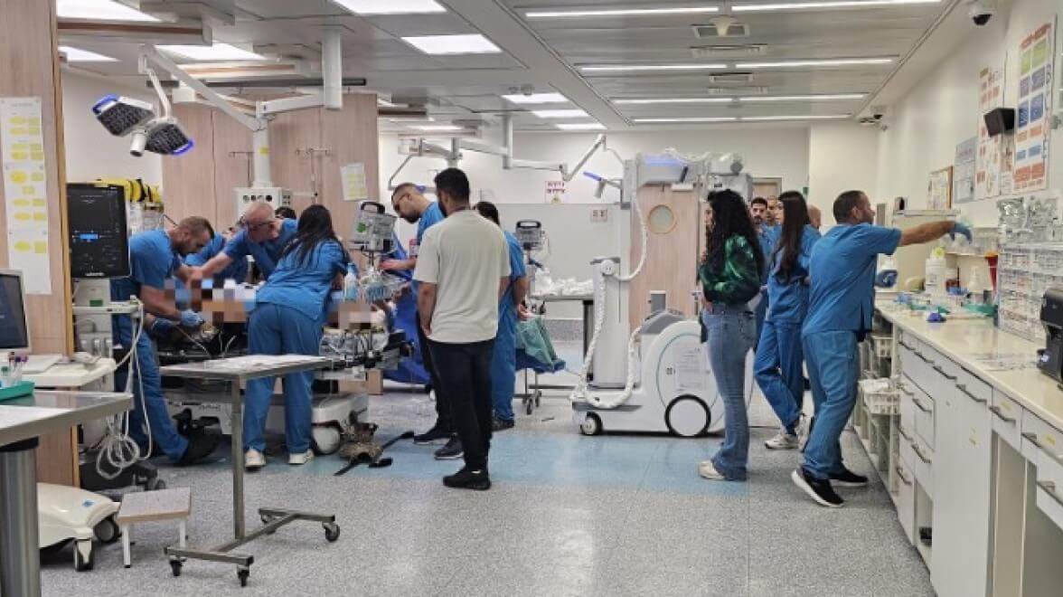 group of doctors taking care of patient
