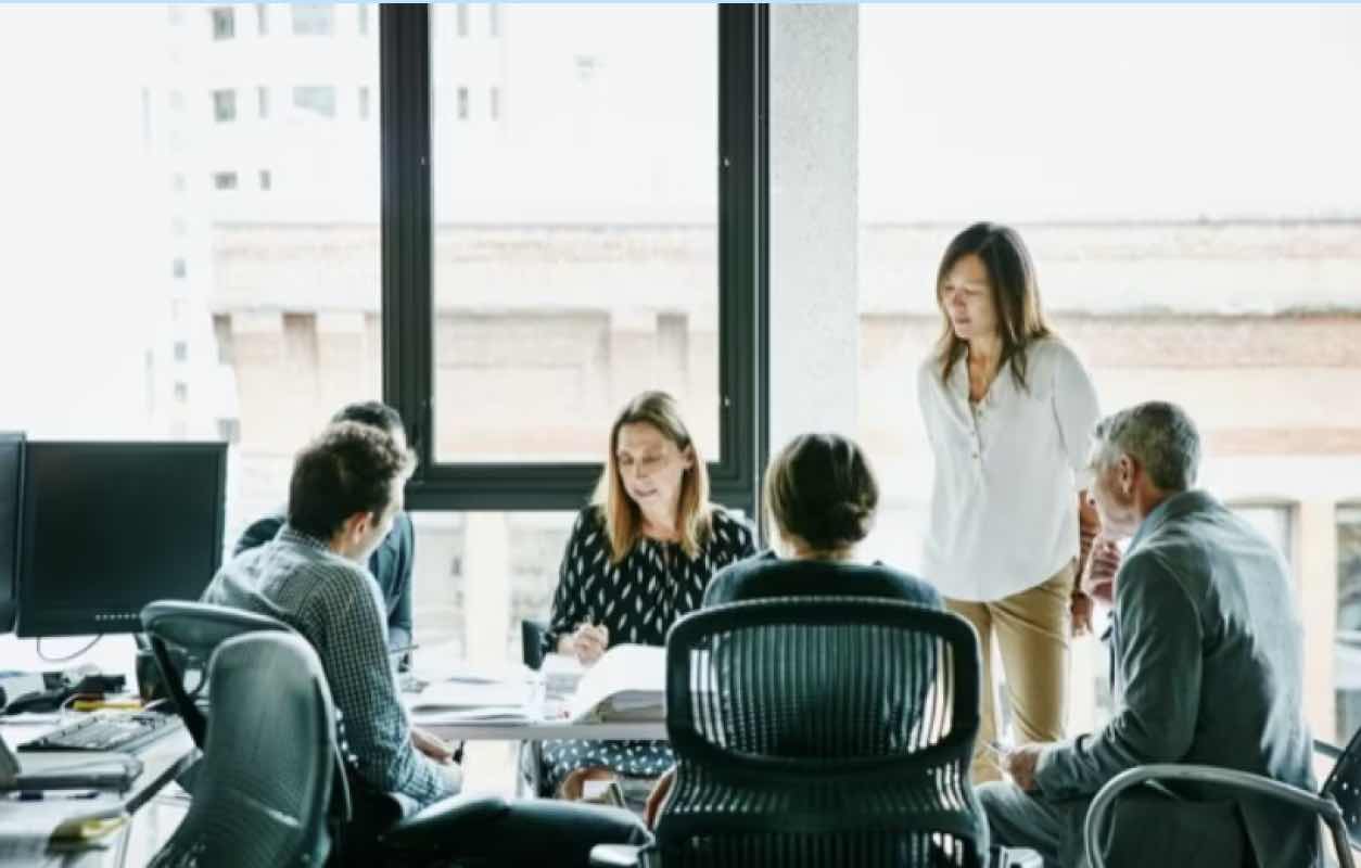 Employees talking to each other