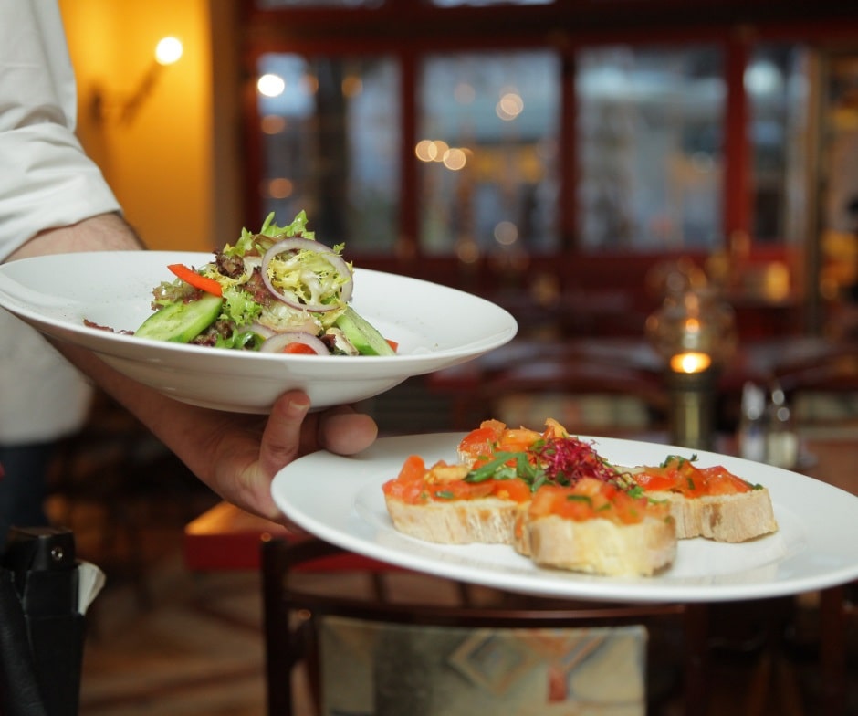waiter carrying food