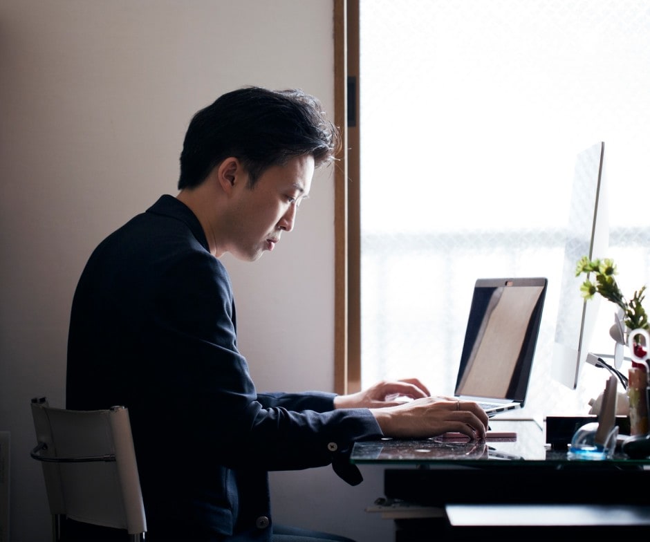 man working on laptop