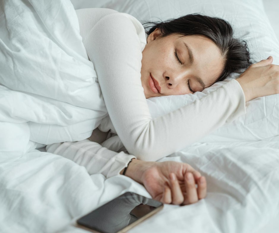 person sleeping in bed