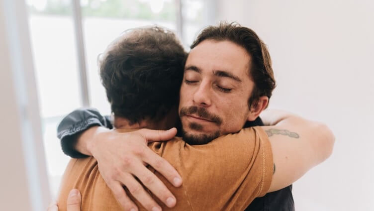 two people hugging