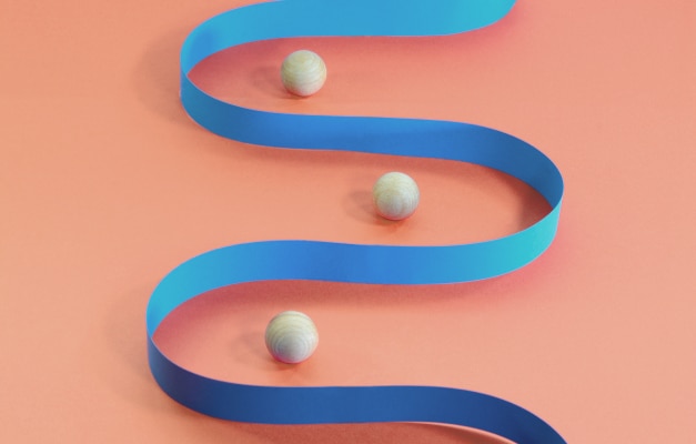 blue ribbon and wood spheres