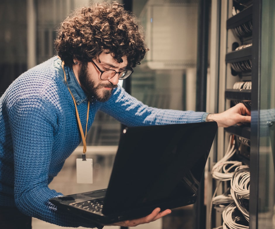 person working on server rack