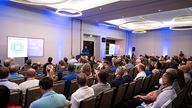 group listening to a technical presentation