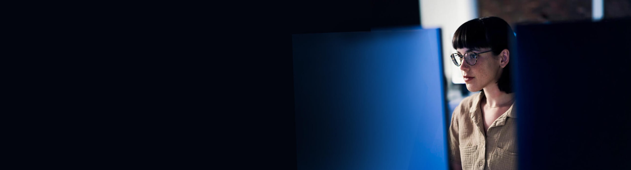 A person looking into the monitor
