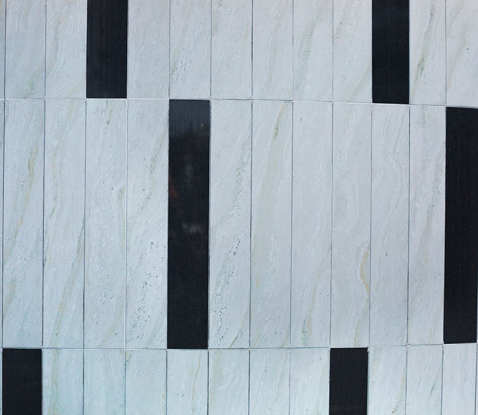 piano keys themed white and black bricks on wall