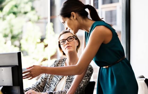 two people talking in an office
