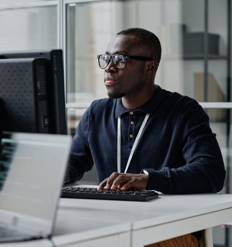 Man working at desk in office building