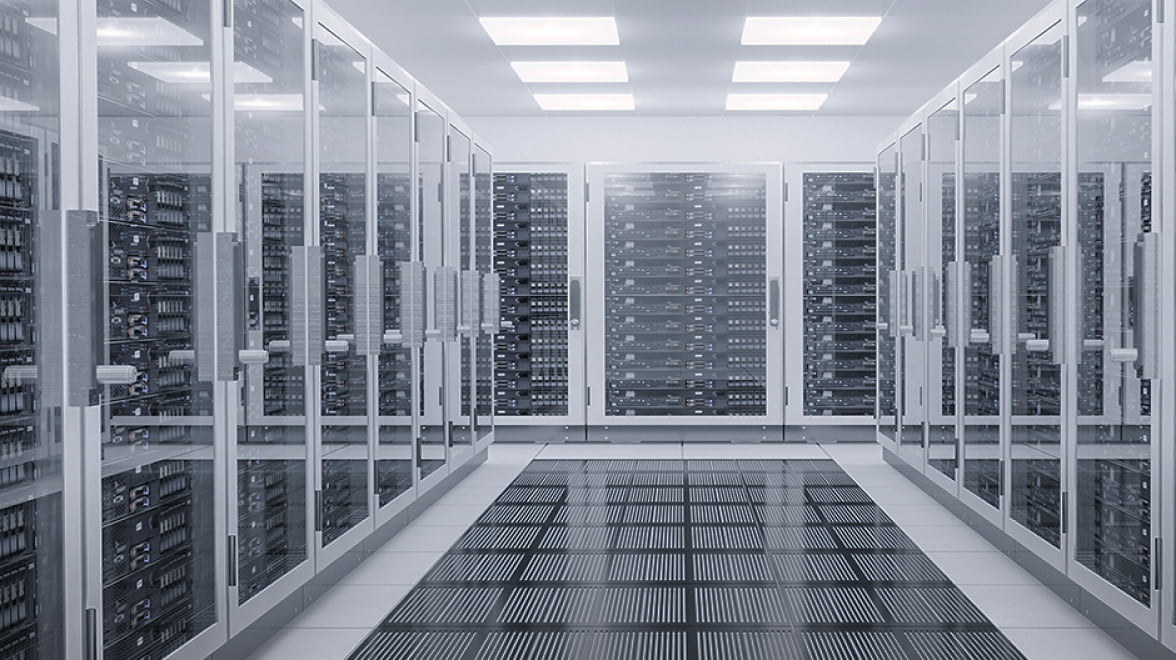 Large room of data storage behind glass doors