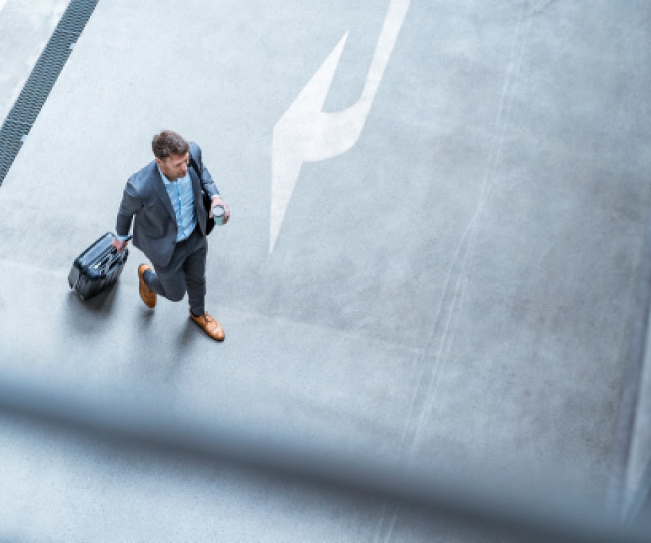man walking with a bag