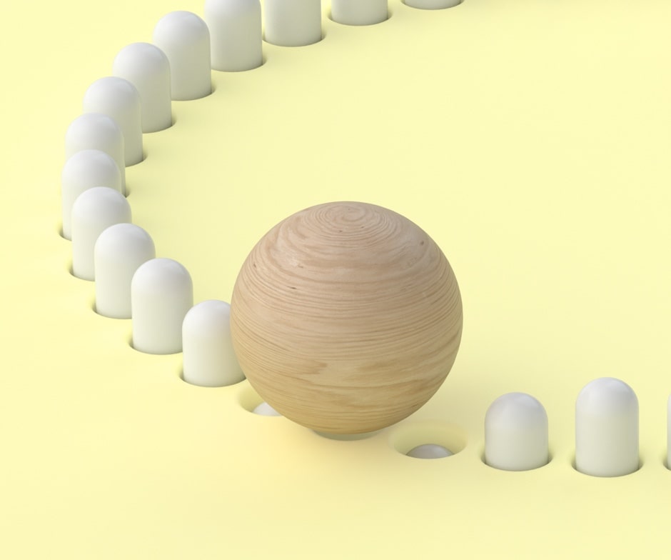 wooden ball rolling on top white pegs