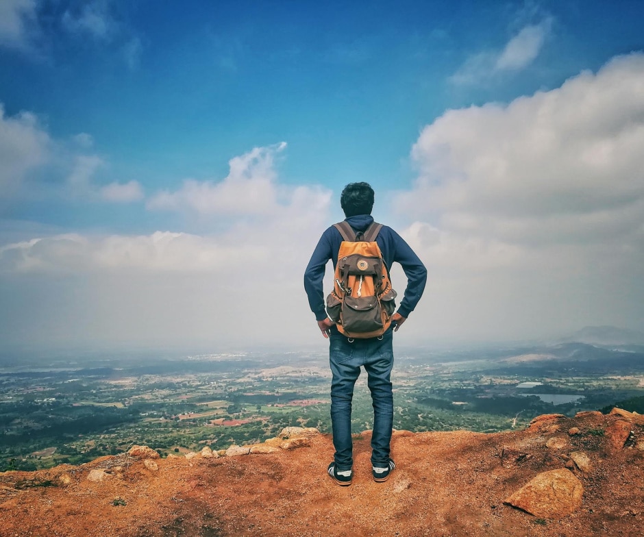 A Person standing and looking into the sky
