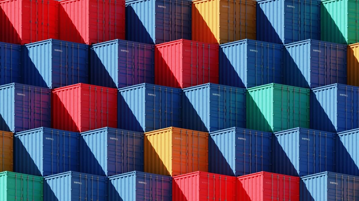 container stacked up on top of ship