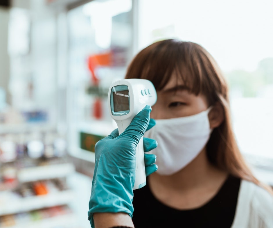 doctor taking temperature
