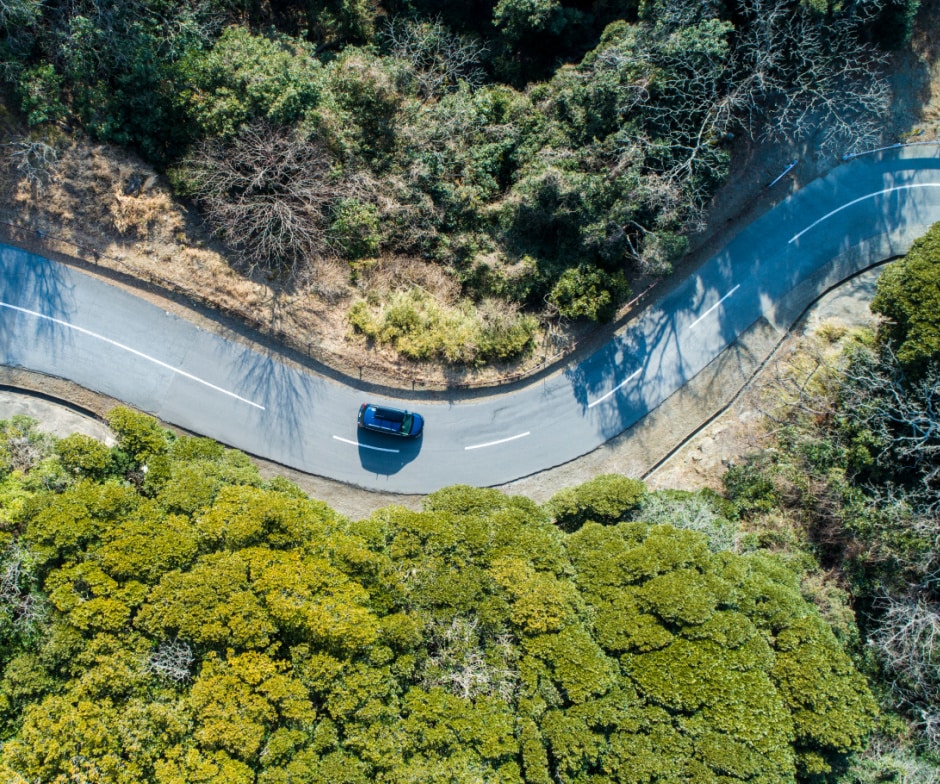 car in a bend loop road
