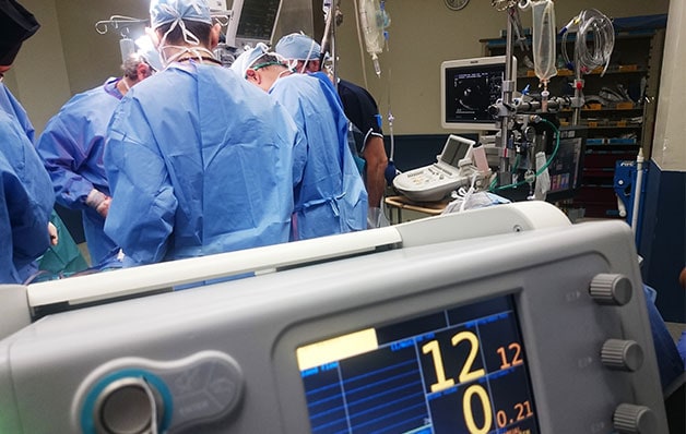 Doctors working in a hospital room